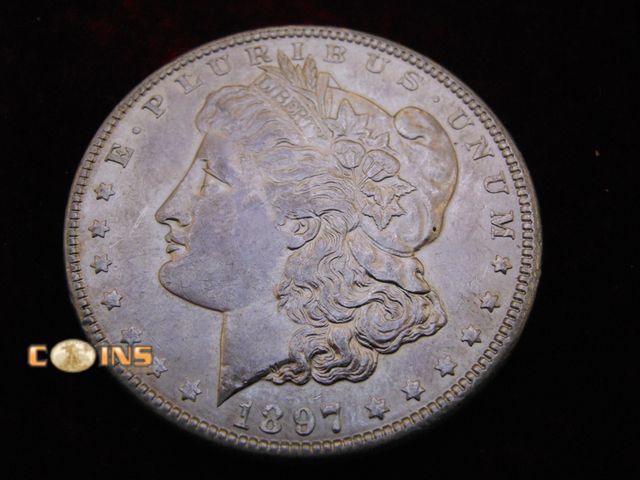 Lot 36-486397 - UNC/BU 1897 Morgan Silver Dollar.  Full Breast Feathers.