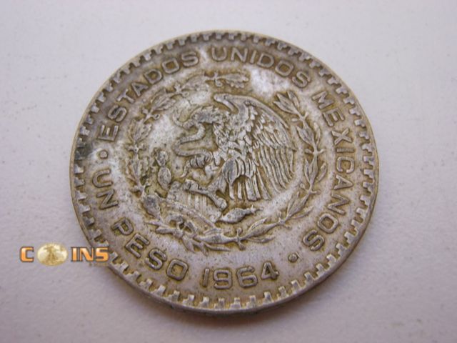 Lot 36-487937 - 1964 Silver Mexican UN Peso.