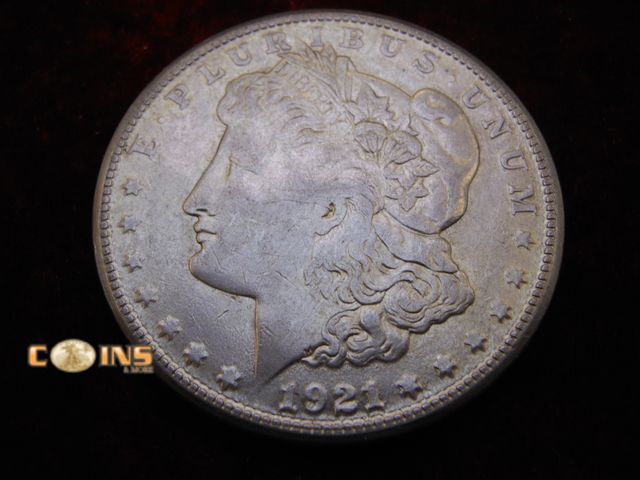 Lot 36-486565 - 1921-S Morgan Silver Dollar.