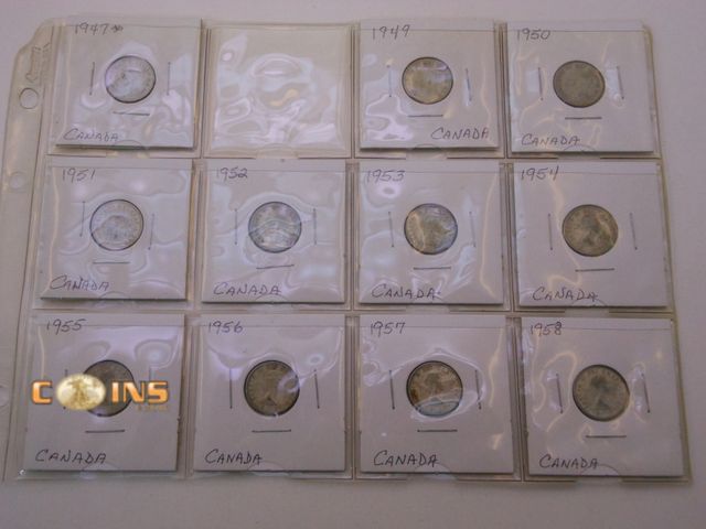 Lot 36-486639 - Lot of Eleven Silver Canadian Dimes, Carded.