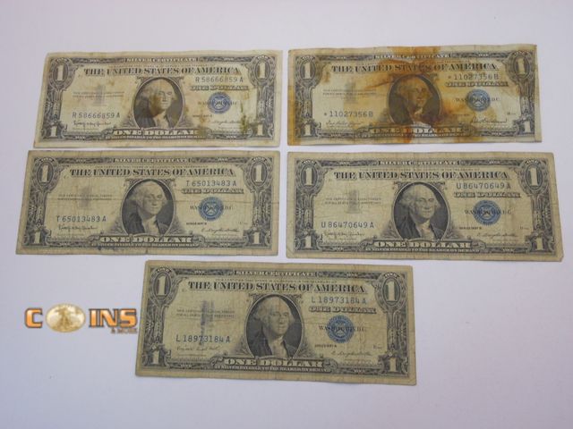 Lot 36-487793 - Lot of Five Blue Seal $1 Silver Certificates.