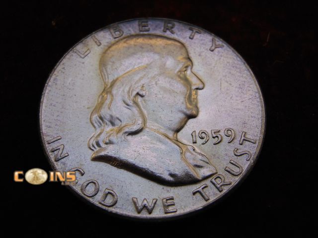 Lot 36-486500 - 1959 Silver Franklin Half Dollar. Bell Lines Visible.