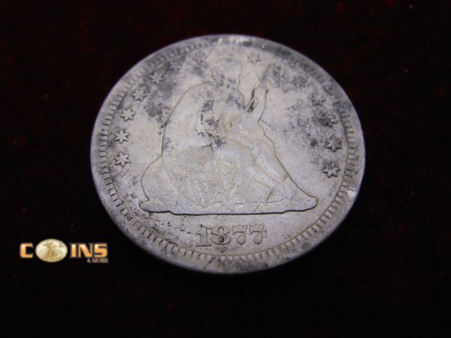 Lot 36-487752 - BETTER CONDITION 1877-CC Silver Seated Quarter.
