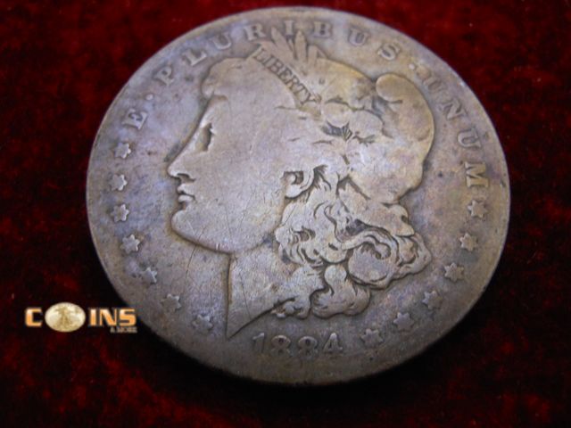Lot 36-487977 - 1884-O Morgan Silver Dollar.