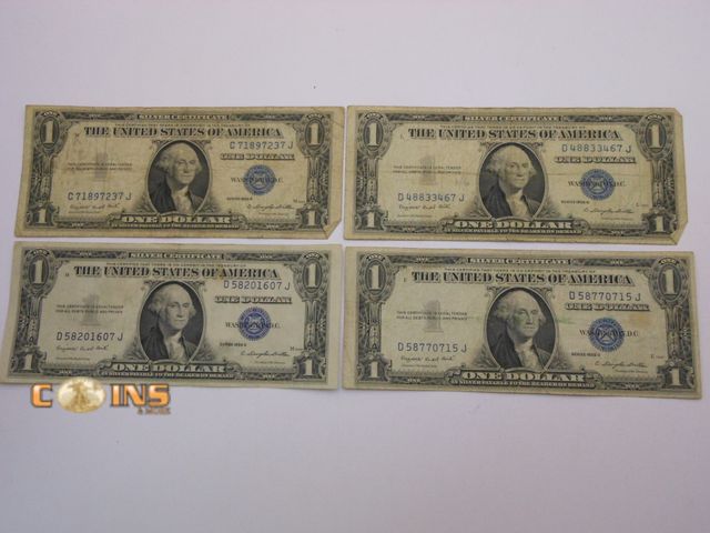 Lot 36-486616 - Lot of Four Blue Seal Silver Certificates.