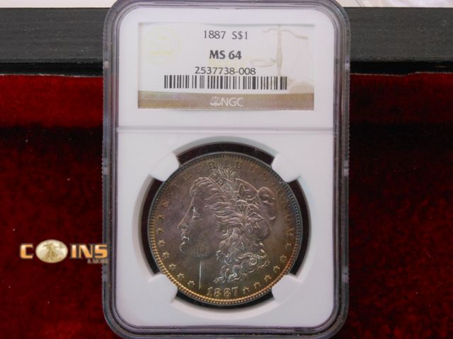 Lot 36-486419 - 1887 NGC Graded MS64 Morgan Silver Dollar.
