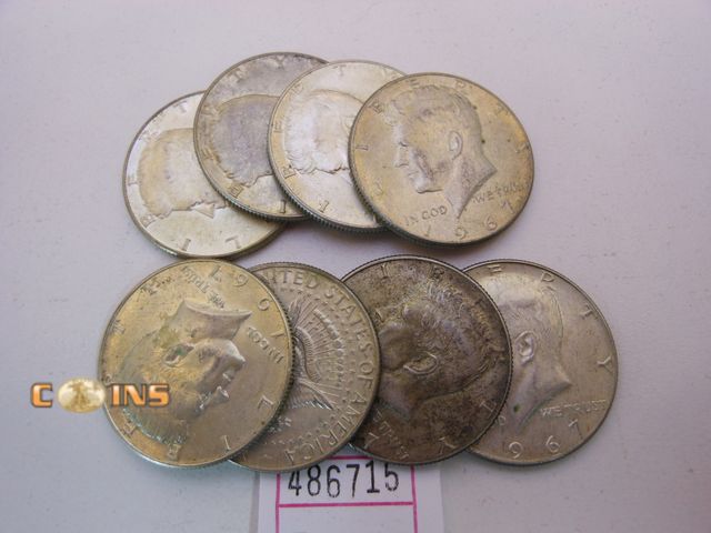 Lot 36-486715 - Lot of 8 Silver Kennedy Half Dollars.