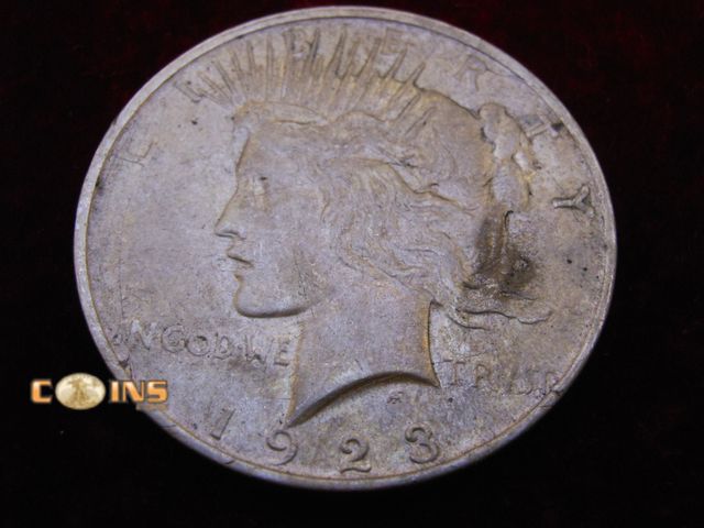 Lot 36-487316 - 1923-D Silver Peace Dollar.