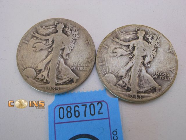 Lot 36-086702 - Lot of Two Silver Walking Liberty Half Dollars.