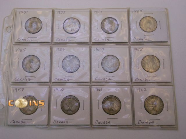Lot 36-486632 - Lot of Twelve Silver Canadian Quarters, Carded.