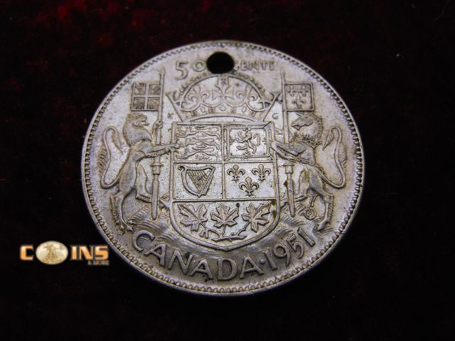 Lot 36-486621 - 1951 Canadian Silver Half Dollar.