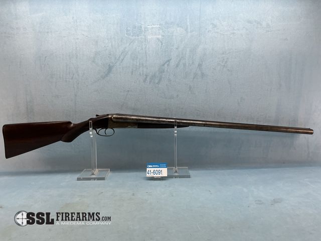 Lot 41-6091 - Triumph Side By Side 12 GA Break Action Shotgun