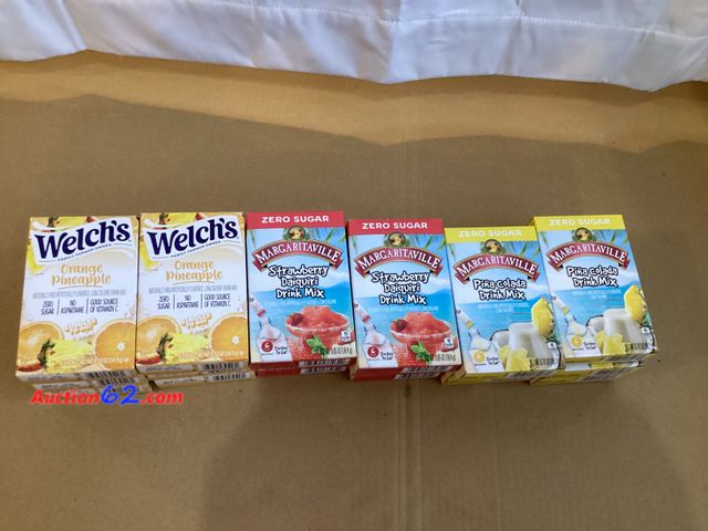 Lot 44-7721i - Lot of (18) drink pack mixes. (6) orange pineapple, (6) strawberry daiquiri, (6) pina colada.  Appears New, A basic inspection has been give...