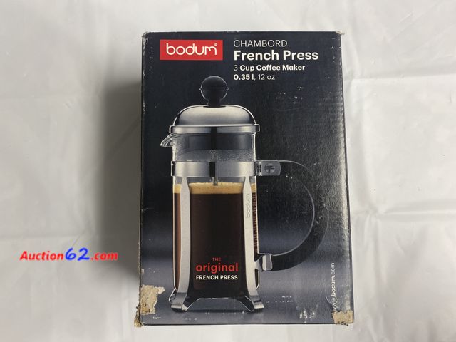 Lot 44-2148g - New with box damage. Bodum brand. Chambord French Press 3 cup coffees maker, 12 oz. Amazon retails for 24.99. See photos. Appears New, A bas...