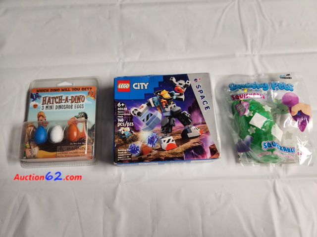 Lot 44-2107g - 1-Lego City Space Construction Mech 140 pieces building toy. 1 Hatch a Dino 3 mini dinosaur eggs-add water watch it hatch and grow. Gets sma...