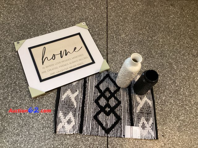 Lot 44-7700b - Lot of (1) woven rug, (1) piece of wall art, (2) vases.  Appears New, A basic inspection has been given to this item. Sold AS-IS. See All Ph...