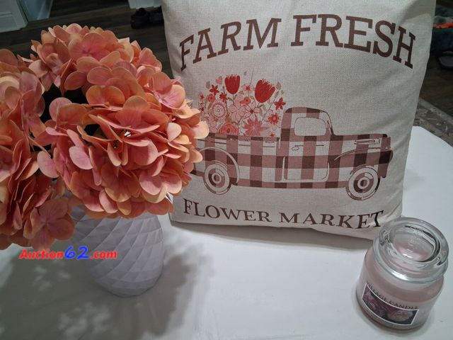 Lot 44-2022o - One new white vase with pink flowers, measures approximately 13" with flowers.  One new 2 wick Village candle, scent Fresh Cut Peony.  One n...