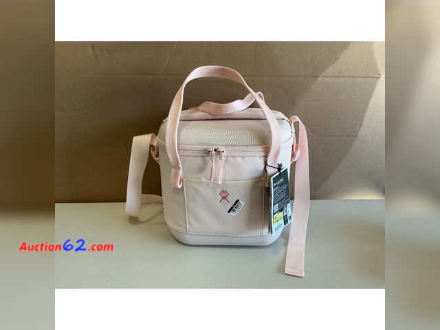 Lot 44-1536 - Hydro Flask Cooler Bag - Insulated Soft Lunch Bag - 12 L Capacity in Trillium Pink E-Commerce Return, A basic inspection has been given to t...