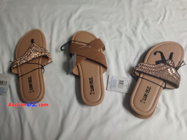 Lot 44-2301b - Three new with tags Luk Ees shoes made by Muk Luks.
  One pair women 7/8. Other 2 pair are 9/10.  See photo. 1. Appears New, A basic inspect...
