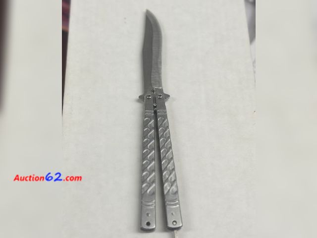 Lot 44-6012a - Butterfly knife metal color # 78003. Appears New, A basic inspection has been given to this item. Sold AS-IS. See All Photo's