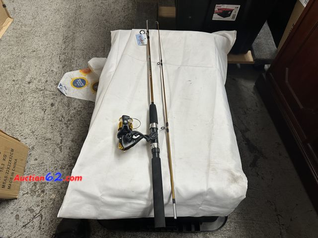 Lot 44-6115e - Yeehaw fishing gear 2 pc rod and matching cams outdoors open face reel. Golden bronze in color. Appears New, A basic inspection has been giv...