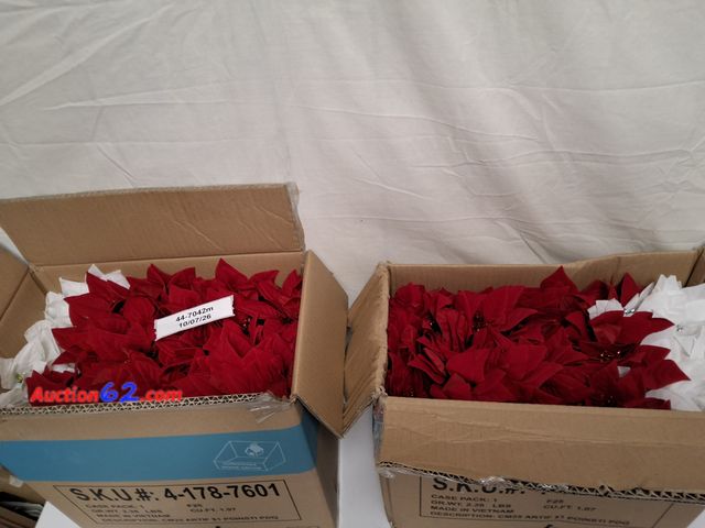 Lot 44-7042m - 2 boxes of 25 artificial poinsettias Appears New, A basic inspection has been given to this item. Sold AS-IS.