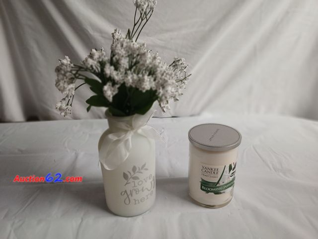 Lot 44-2137g - New 8" vase with baby breath and one new 6" double wick blooming jasmine Yankee candle.  See photos. Appears New, A basic inspection has bee...