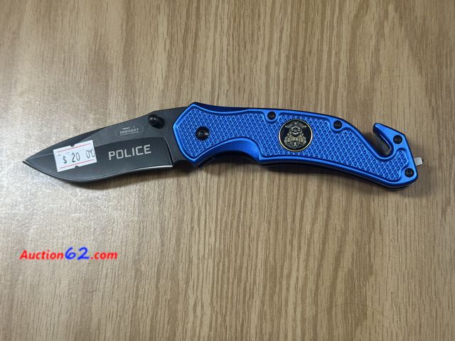 Lot 44-6125q - Kentucky cutlery lock blade police knife with belt clip, and glass breaker. #70803. Pre tagged $20 from store closing. New no box Appears Ne...