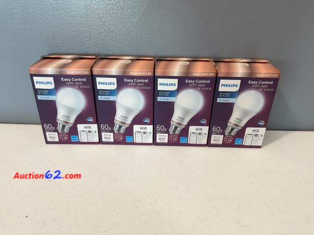 Lot 44-1533p - $44 Retail value- lot of (4) 60-Watt Equivalent A19 LED Daylight (5000K) Smart Wi-Fi Light Bulb Powered by WiZ with Bluetooth  Appears New, ...