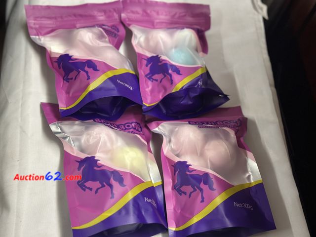 Lot 44-6031a - 4 pack of 3-4 bath bombs. New. See All Photo's Not Tested Never opened, Factory Sealed Unmarked, No barcodes