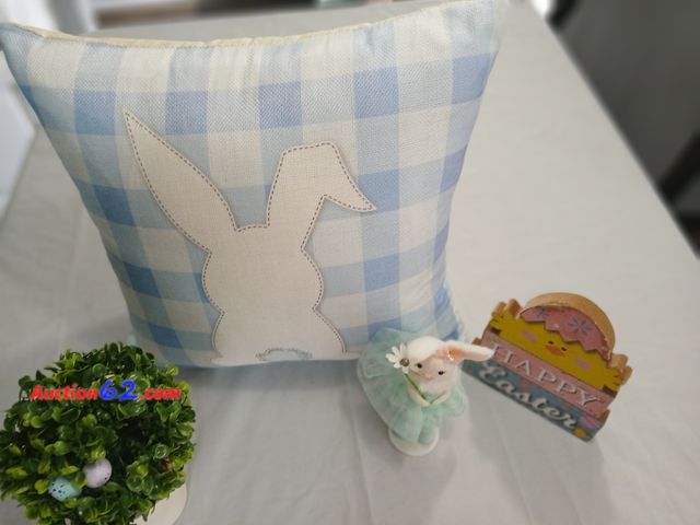 Lot 44-2133j - New bunny pillow, measures approximately 15" x 14".  One new Easter egg plant, measures approximately 9" tall..  One new with tag Happy East...