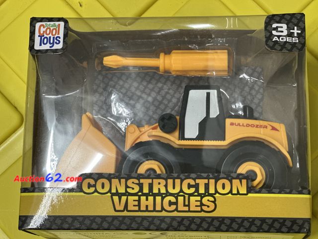 Lot 44-7596b - Cool toys construction vehicles bull dozer comes wit screw drive to take apart. Ages 3+. New. 5. Not Tested 13. Never opened, Factory Sealed