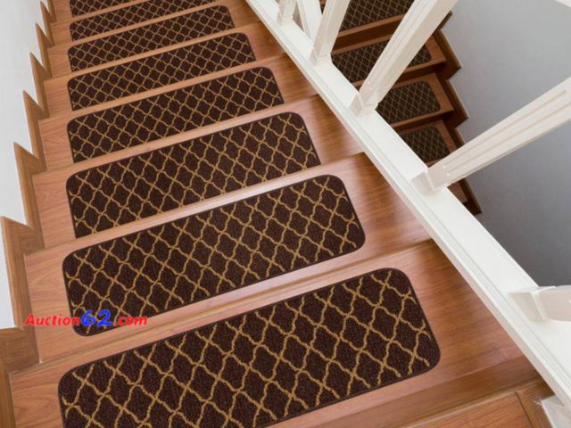Lot 44-747b - Retail value $51- Trellis Brown 26 in. x 8.5 in. Non-Slip Rubber Back Stair Tread Cover (Set of 13) 1. Appears New, A basic inspection has b...