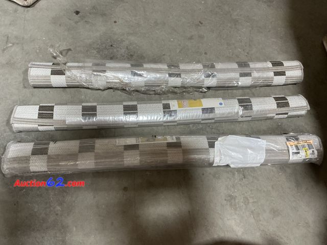 Lot 44-202b - Lot of (3) 3’11” X 5’5” Checkered Outdoor Rugs E-Commerce Return, A basic inspection has been given to this item. Sold AS-IS.