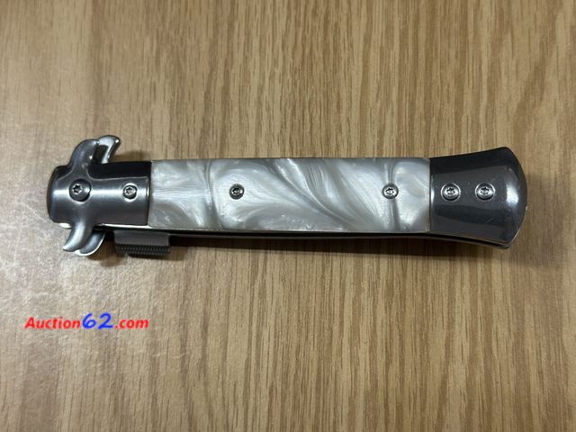 Lot 44-6099o - Kentucky cutlery white synthetic pearl handle knife with belt clip and fold out blade.# 70818 440 stainless steel blade. NEW NO BOX.