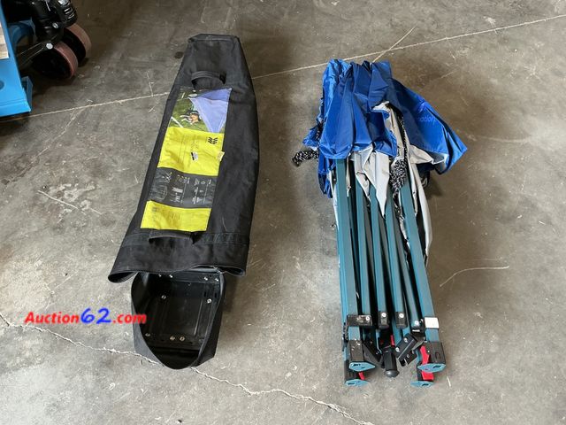Lot 44-126f - $150 Retail price - Blue Pop-Up Canopy Tent with Carrying Bag See All Photo's E-Commerce Return, A basic inspection has been given to this i...
