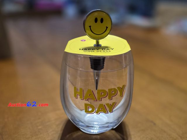 Lot 44-3043q - Happy Day Wine Glass and Wine Bottle Stopper - New in Box - See Pictures Appears New, A basic inspection has been given to this item. Sold A...