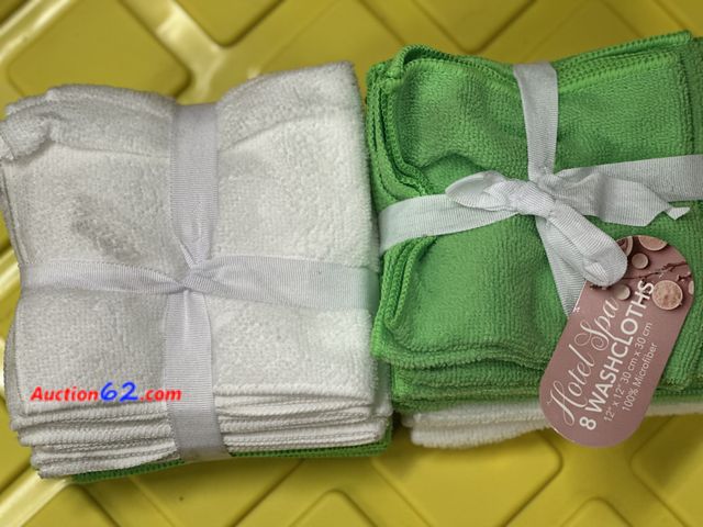 Lot 44-7524b - 2 packs of 8 washcloths both colors are shown. See photo. New Hotel spa 12x12 microfiber are little dirt from box 5. Not Tested 13. Never op...