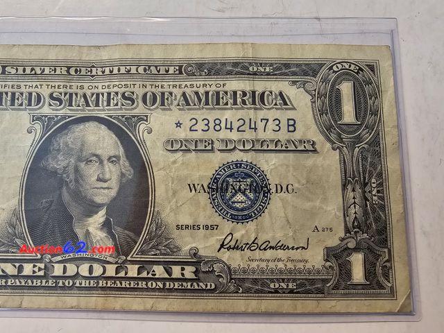 Lot 44-8333q - 1957 B SERIES $1 SILVER CERTIFICATE STAR NOTE. CIRCULATED. A STAR NOTE IS A REPLACEMENT NOTE FOR WHERE AN ERROR OCCURRED IN THE PRINTING. FR...