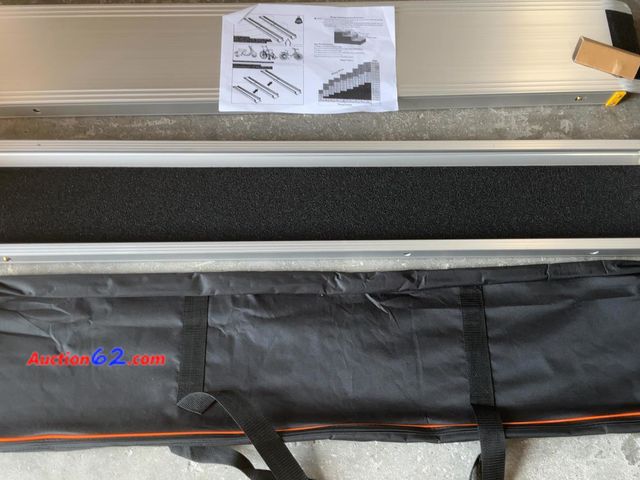Lot 44-305M - 7FT Adjustable Telescoping Wheelchair Ramps 600 LBS Capacity Aluminum See All Photo's E-Commerce Return, A basic inspection has been given t...