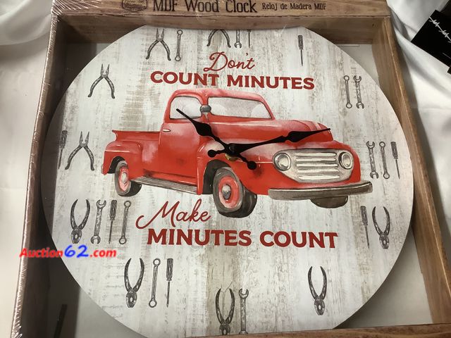 Lot 44-7588t - Ol’ red truck clock “Don’t count minutes, make minutes count”. Approximately 13 inches.new. See All Photo's Not Tested Never opened, Factory...