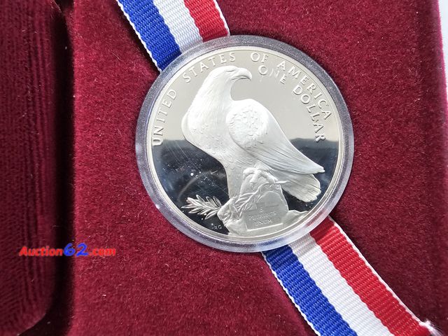 Lot 44-8331k - LOS ANGELES 1984-S OLYMPICS 90% SILVER DOLLAR MADE BY THE SAN FRANCISCO MINT. COMES IN ORIGINAL MINT PACKAGING W/CERTIFICATE OF AUTHENTICITY...
