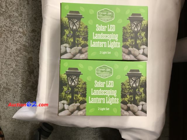 Lot 44-6004w - 2 sets of Solar LED Landscaping Lantern Lights, 2 light per sets. New. See All Photo's Not Tested Never opened, Factory Sealed