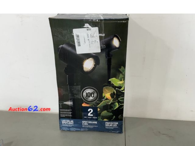 Lot 44-1504j - Tommy Bahama Smart Focus 100/60 Lumen Spot Light with Remote Solar Panel 2 Pack Not Tested See All Photo's E-Commerce Return, A basic inspec...