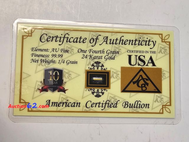 Lot 44-8331i - 1/4 GRAIN .9999 24 KARAT GOLD BAR IN A CARD. MANUFACTURED BY AMERICAN CERTIFIED BULLION-NT