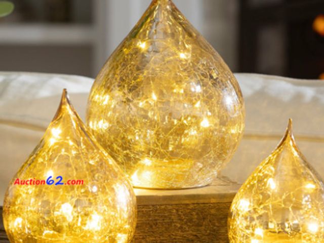 Lot 44-1679t - Beautiful Evergreen LED Glass Gold Raindrops Ball Set of 3, Gold Appears New, A basic inspection has been given to this item. Sold AS-IS. No...
