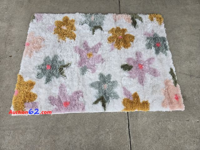 Lot 44-6999p - 4ftx5.5ft Flowery Shag Area Rug  Appears New, A basic inspection has been given to this item. Sold AS-IS.