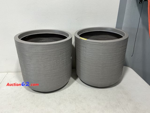 Lot 44-990m - Set of 2 Gray Fluted Outdoor Planters Not Tested See All Photo's E-Commerce Return, A basic inspection has been given to this item. Sold AS-...