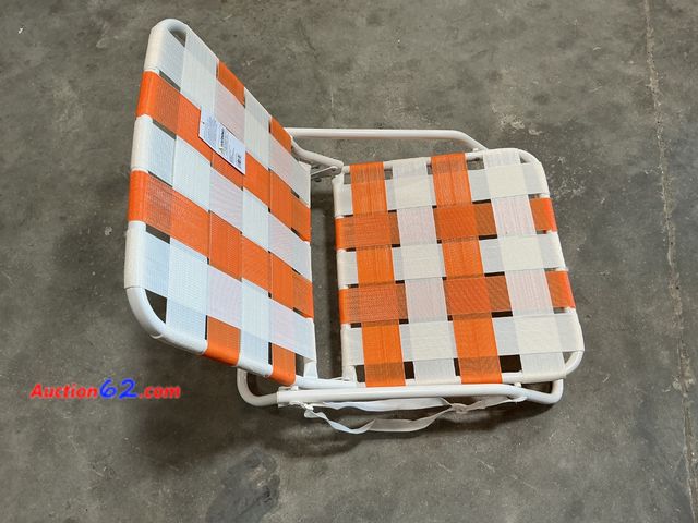Lot 44-270e - Orange and White Striped Webbed Beach Chair Appears New, A basic inspection has been given to this item. Sold AS-IS. See All Photo's