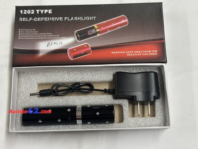Lot 44-6146o - Type 1202 self defense flashlight and taser rechargeable. Opened for photo. Pre-priced $20 from store closing NEW. See All Photo's Tested & ...